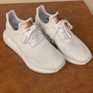 White Adidas women’s tennis shoes